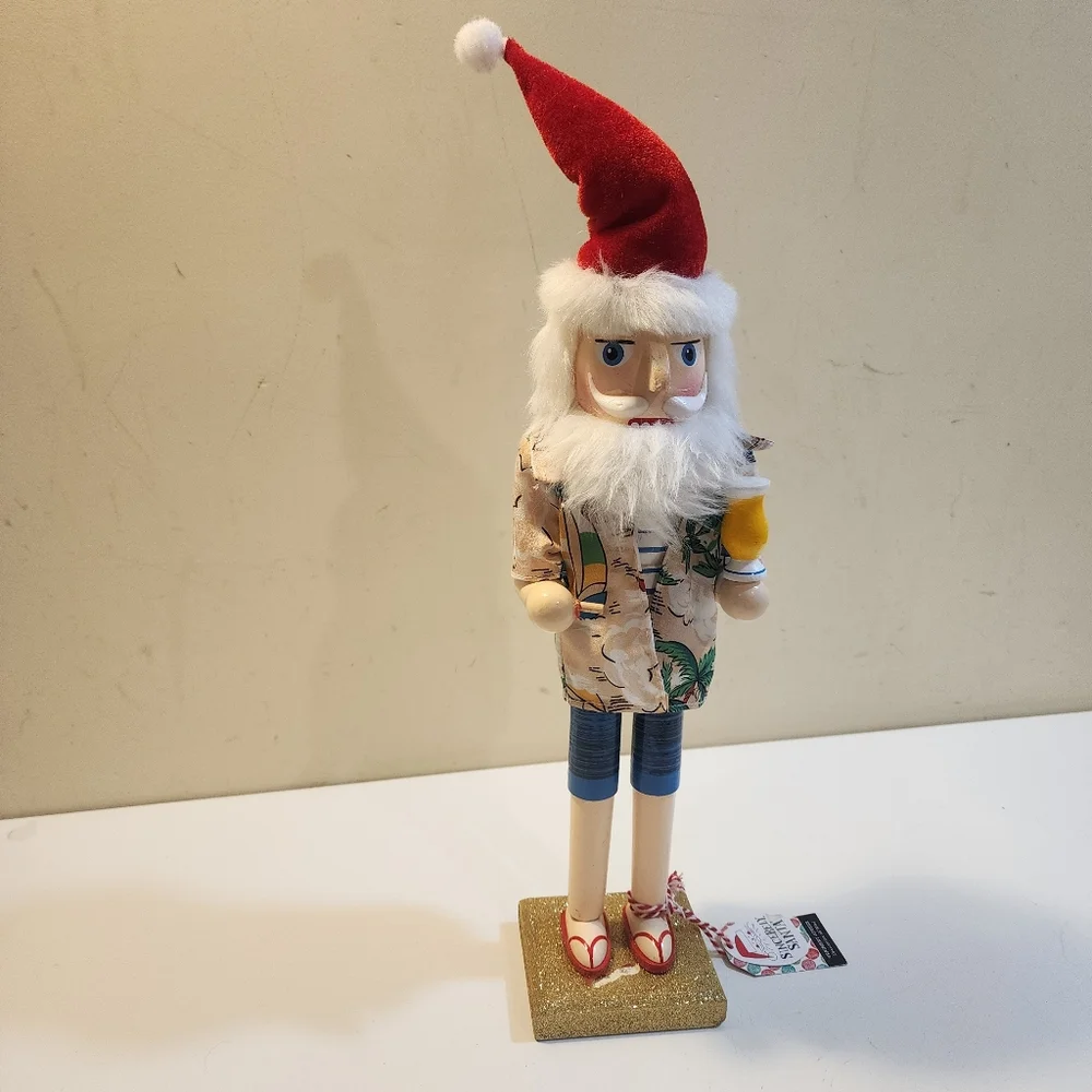 Wooden nutcracker styled as a Beachy  Santa Claus W/floral shirt, sunglasses